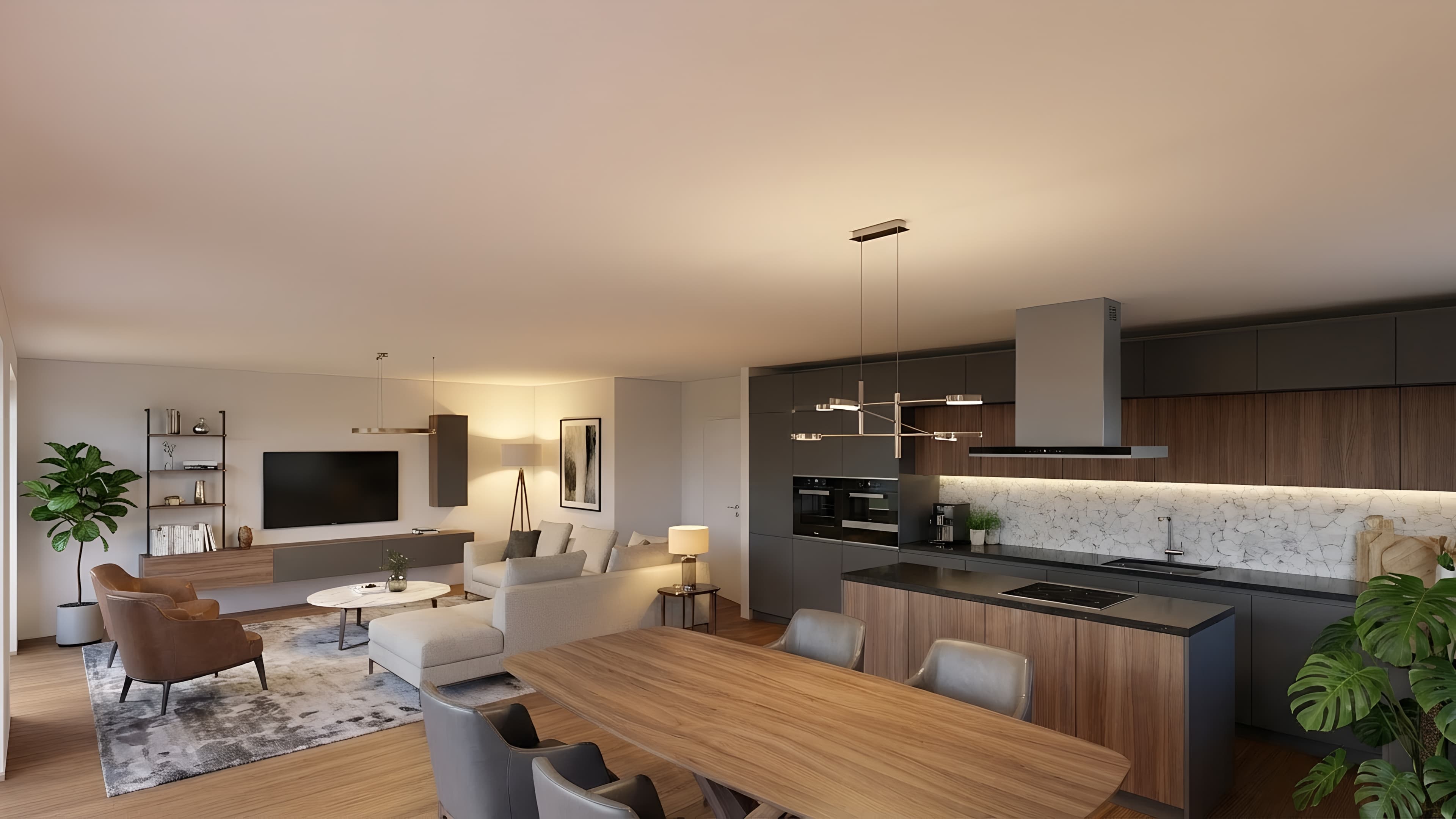 Das offene Wohnzimmer mit Küche besticht durch modernes Design, warmes Licht und einladende Atmosphäre